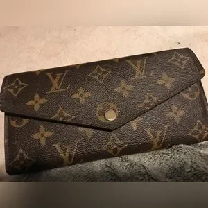 Louis Vuitton “Sarah” wallet Brown Monogram